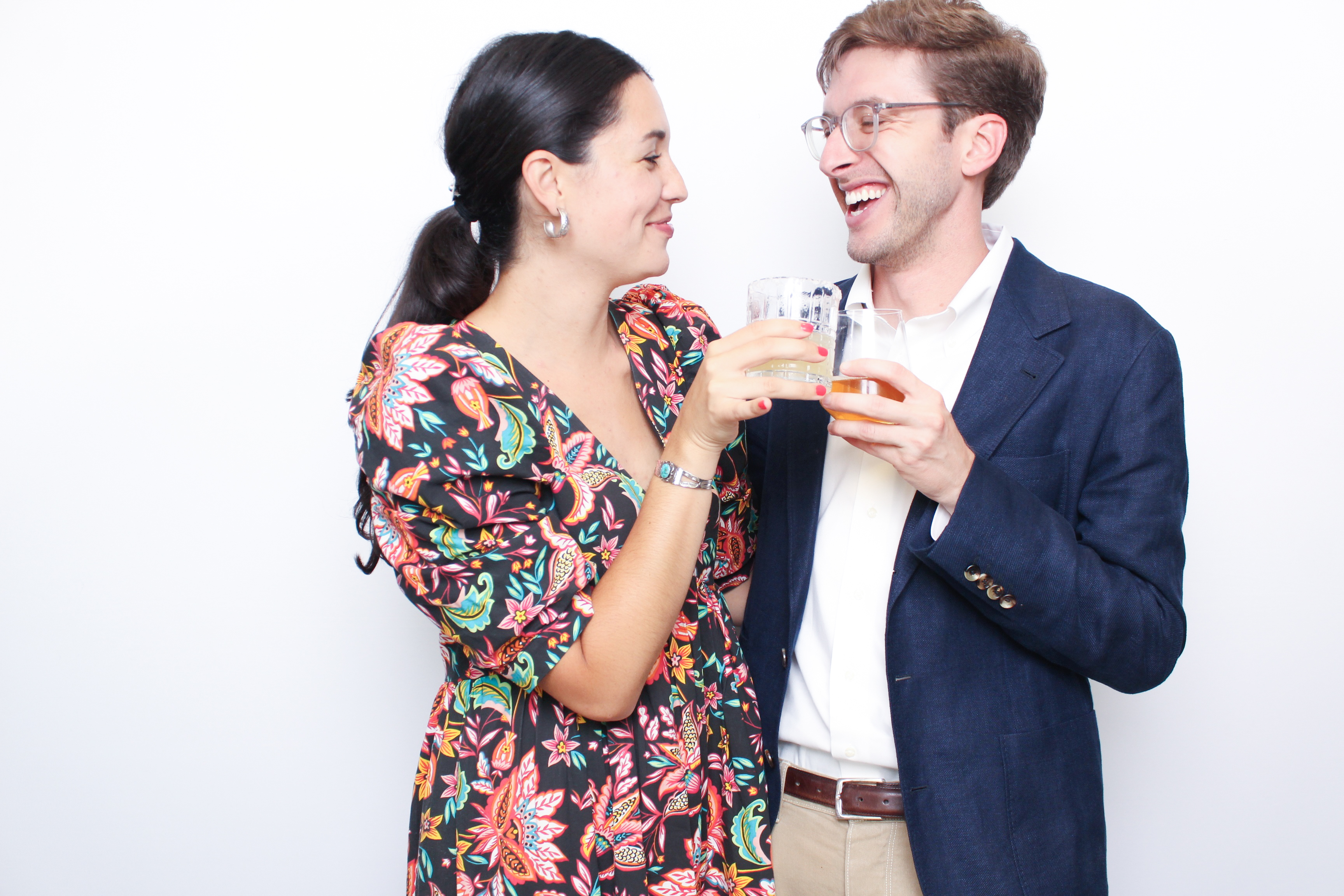 Wedding couple toasting at photo booth